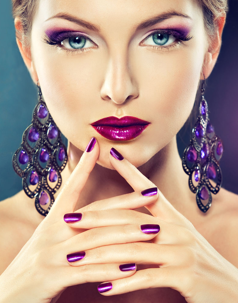 woman wearing amethyst jewel earrings